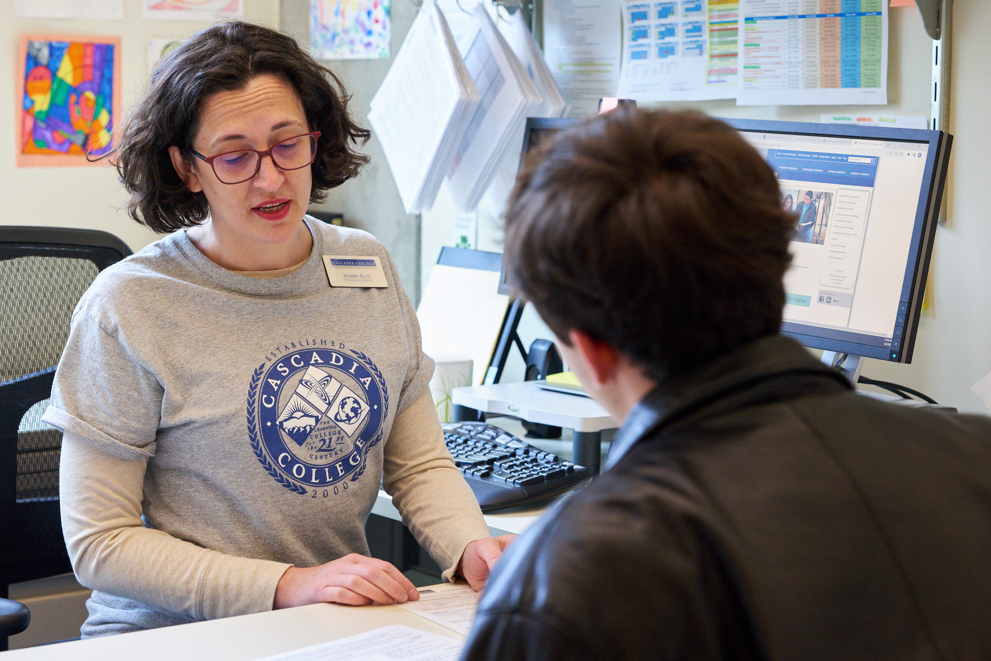 Active Learning Cascadia advisor at desk with student