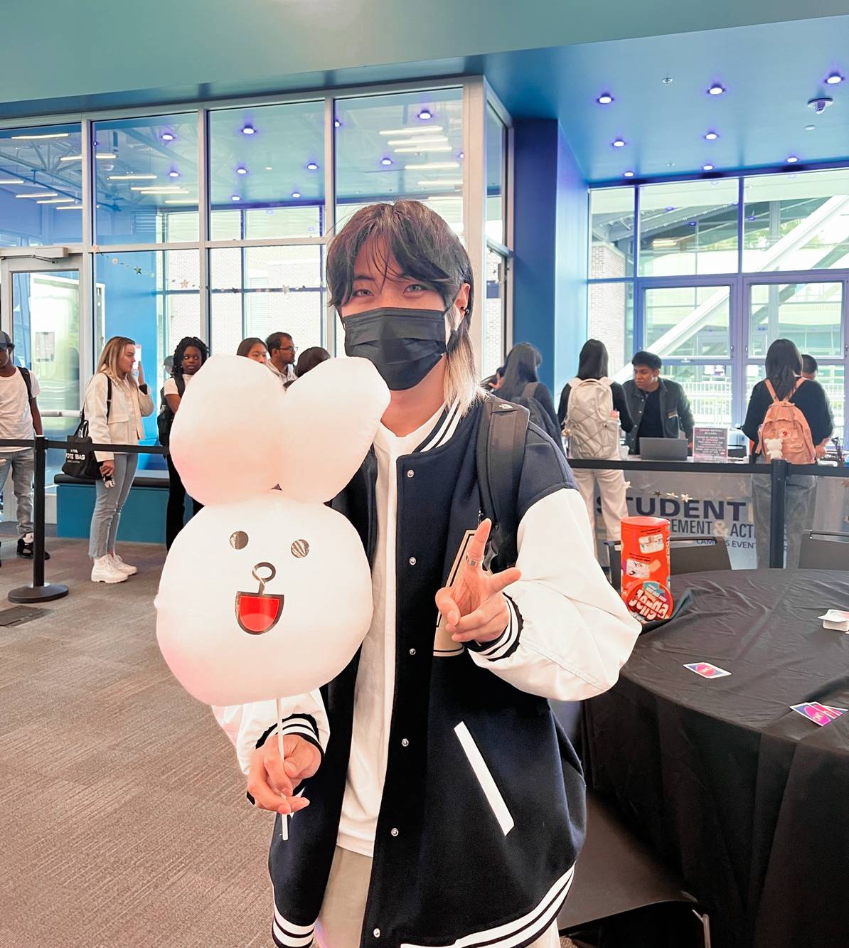 Student Life Students playing football, demonstrating active and energetic participation in a sports activity.
