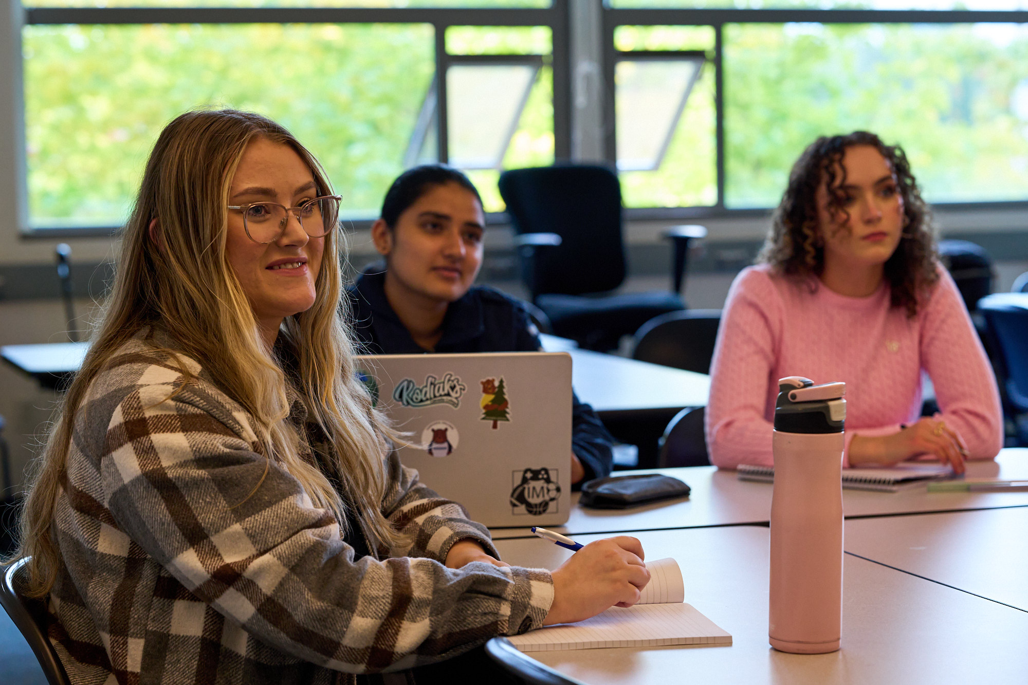 Active Learning Students listening attentively in class.