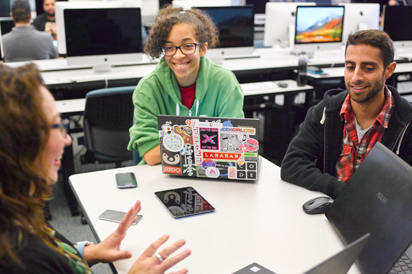 College in the High School Students having conversation in class.