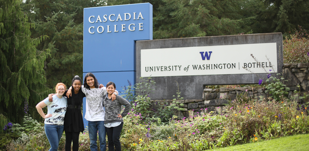 Cascadia UW Sign Sign at the Cascadia College and University of Washington Bothell campus entrance with flowers and landscaping in foreground